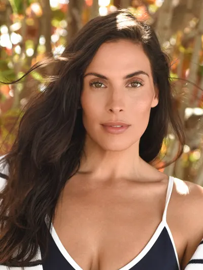 Amy, a longtime Chicago local, photographed outdoors in warm natural light